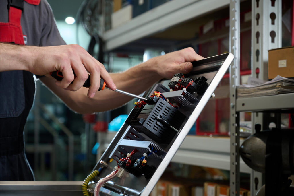 Electrician repairs and diagnoses electrical equipment.