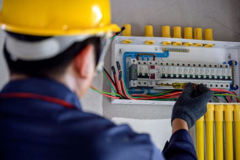 Electrical-worker-install-and-test-electrical-outlets-and-switches-in-house