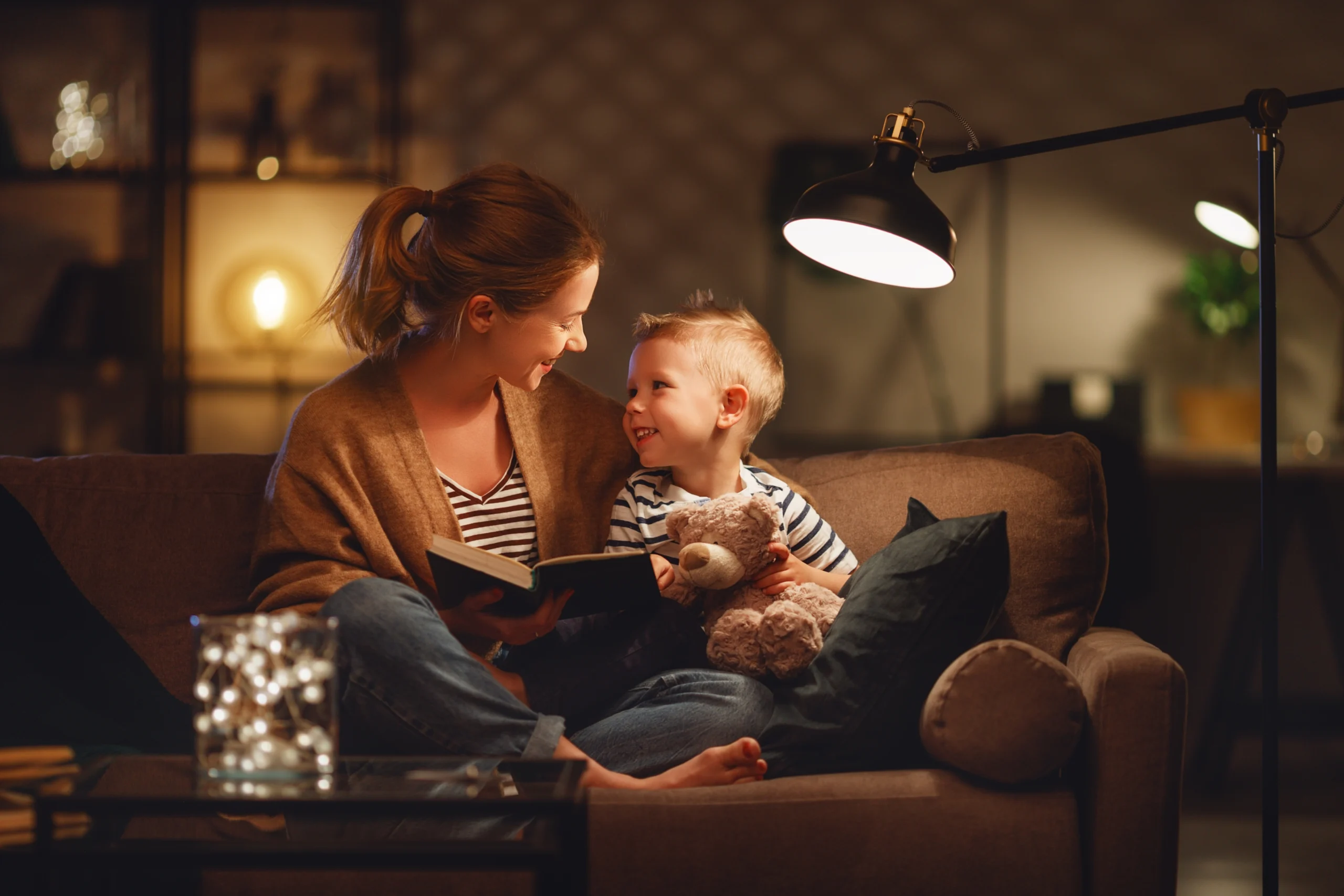Mother and son reading at night