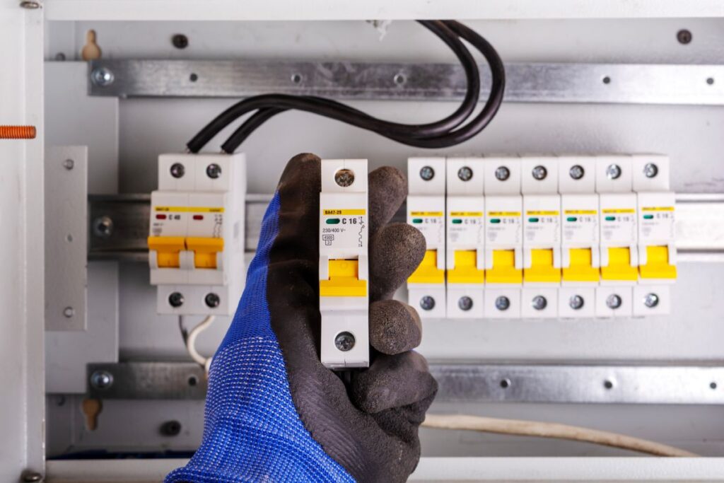 circuit breakers glove holding modern panel