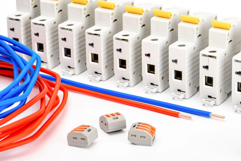 circuit breakers pieces displayed on white table