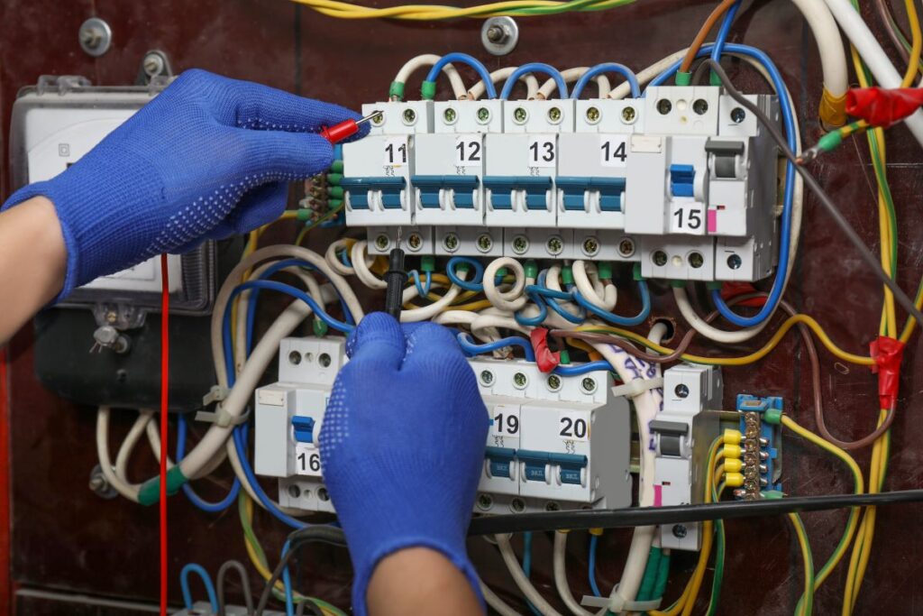 circuit breakers technician fixing wires